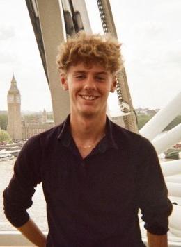 dylan cleverly poses with big ben in london behind him